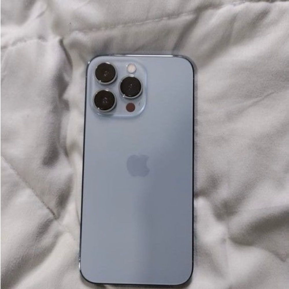 Apple Smartphone in Soft Blue with Triple Lens